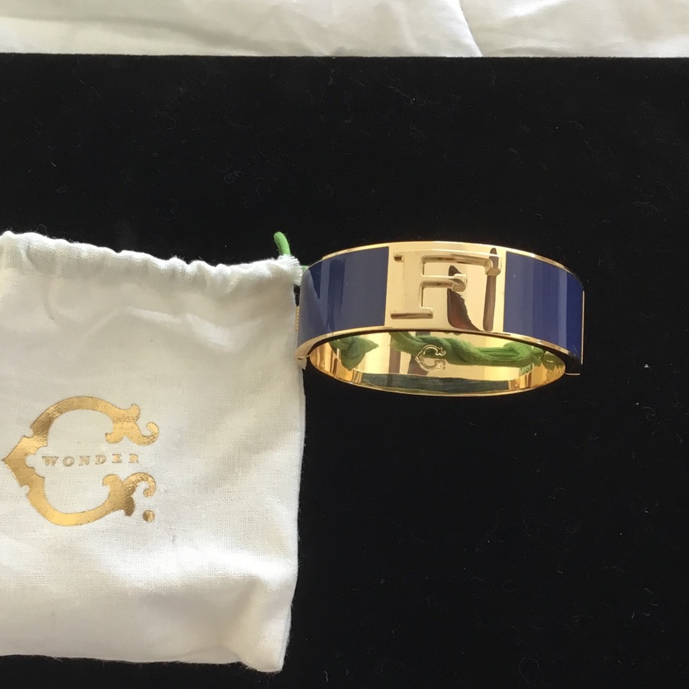 Blue oval enamel letter F bangle.